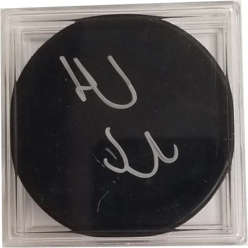 Autograph Hockey Puck: Daniel & Henrik Sedin